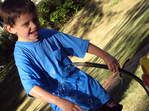 boy_waterhose Picture of Boy with Waterhose