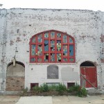 Picture of Old Church with Broken Stained Glass Facade